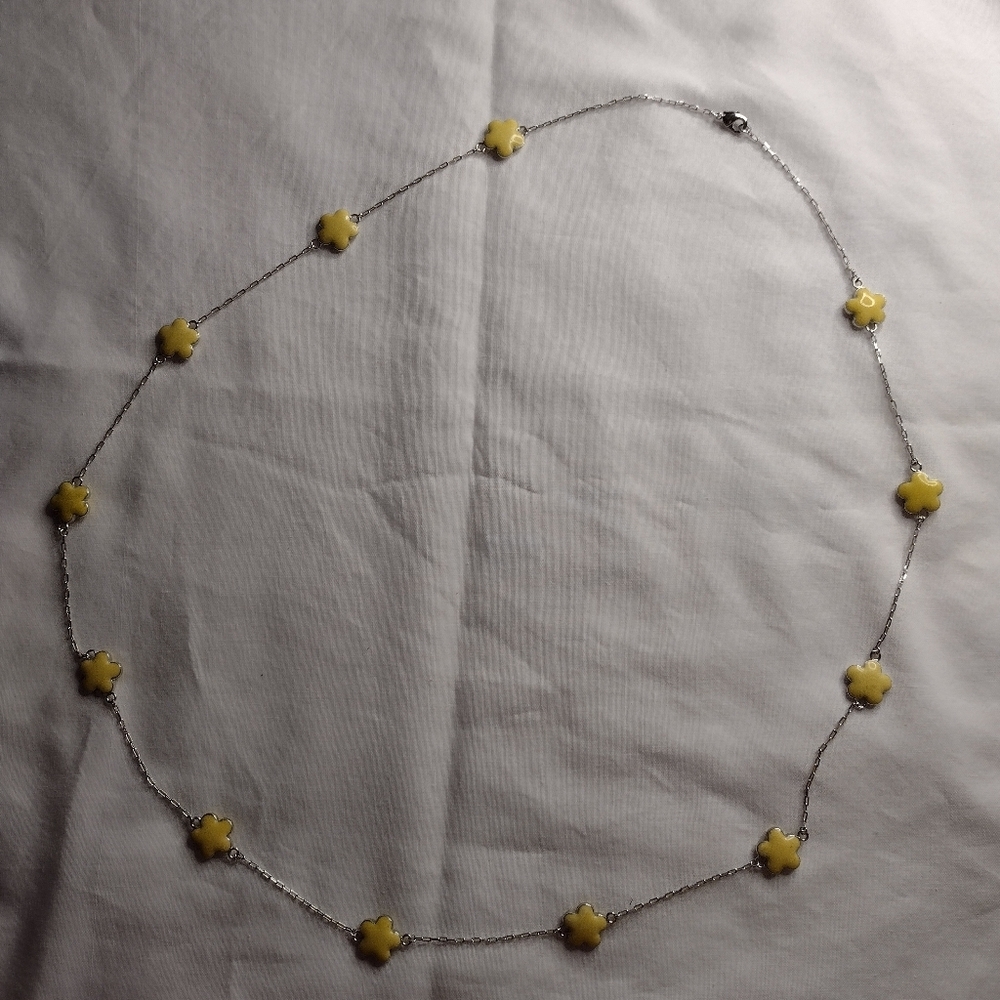 Long silver chain with yellow flowers